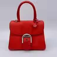 Sac rouge venant d'une friperie geneve