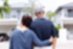 Couple in front of home.jpeg