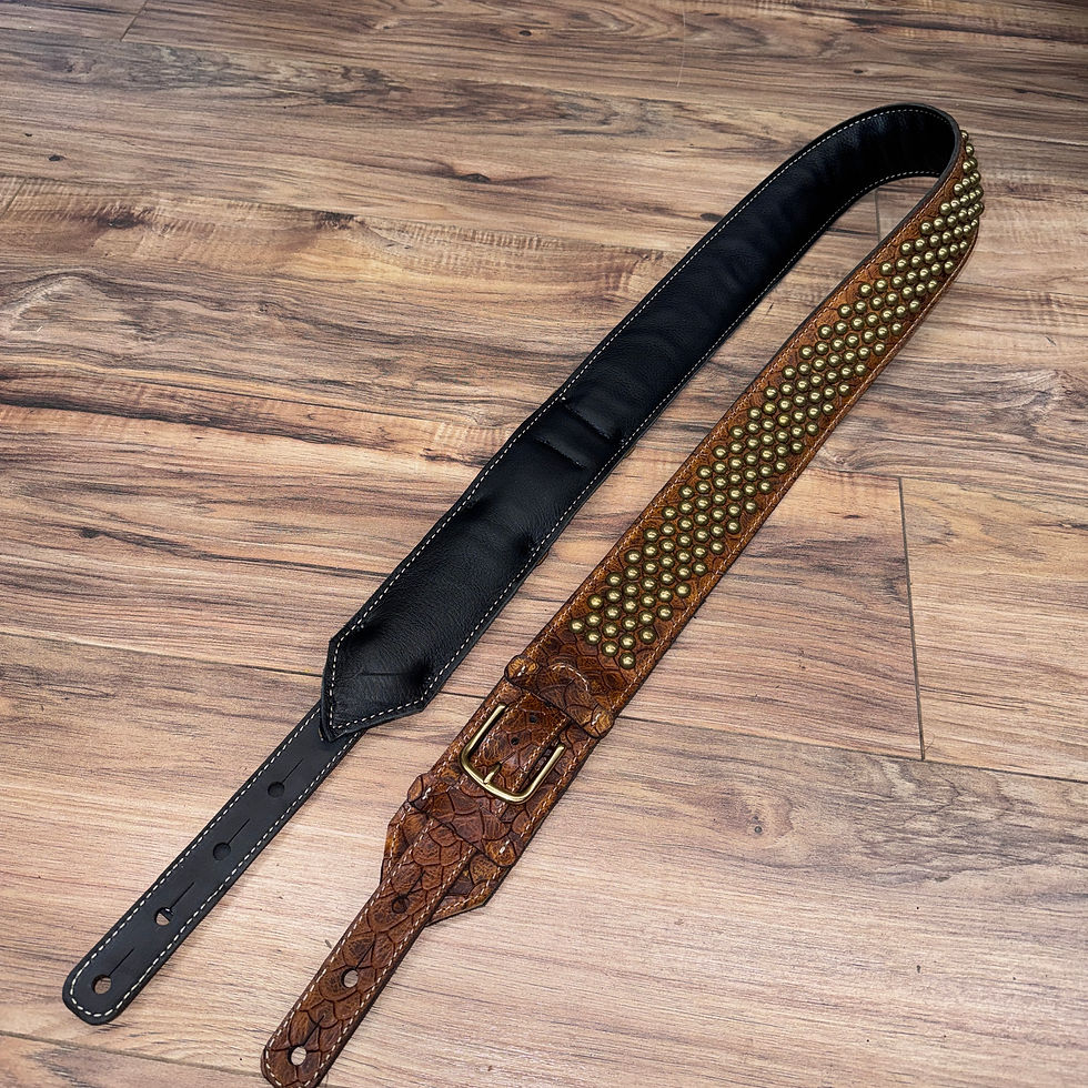 Thumbnail:  Carlino Love Gun ‘77 Stage Strap with tan scale leather with satin bronze studs