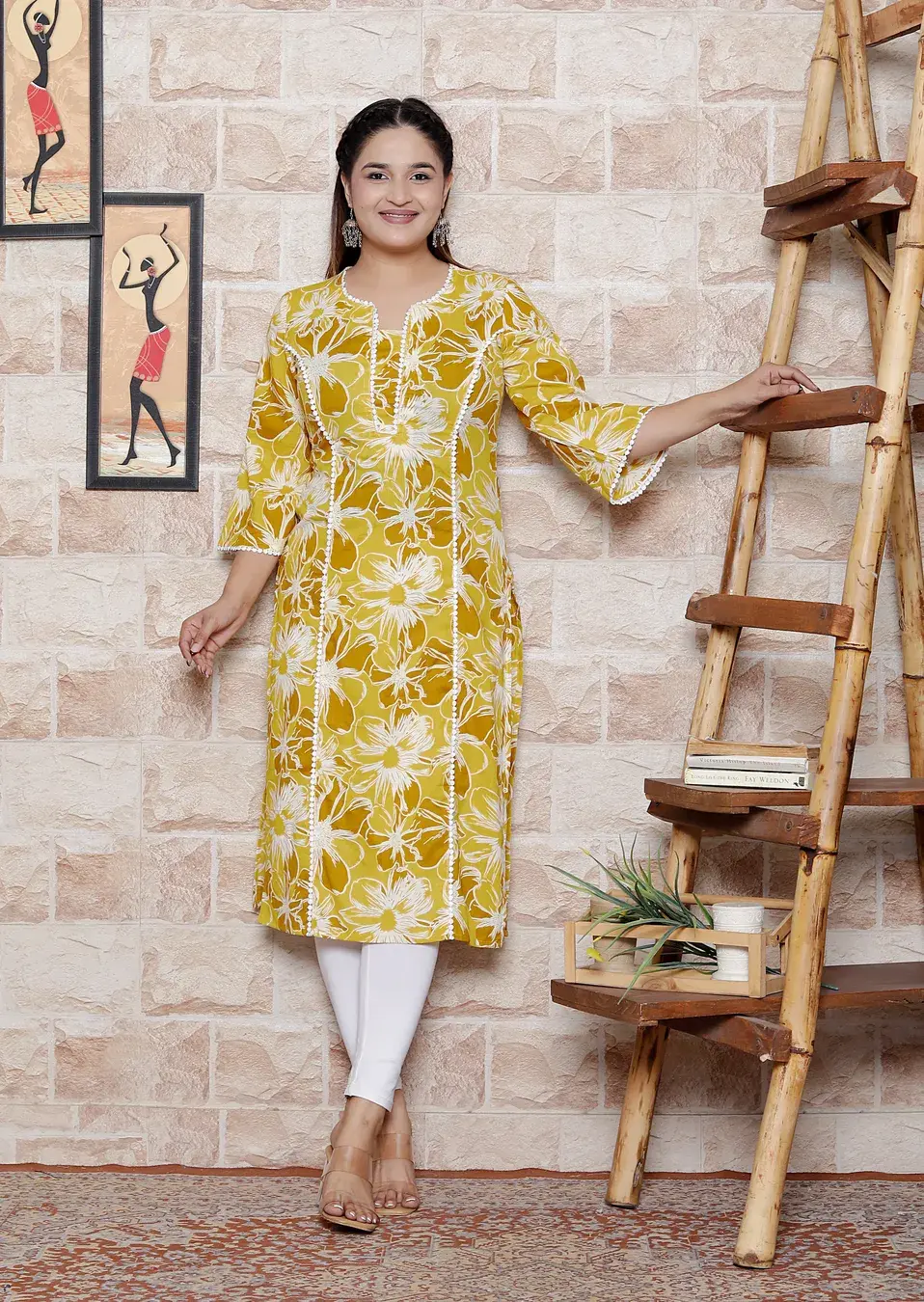 Thumbnail: Yellow floral cotton kurti for women – straight cut front pose ethnic wear