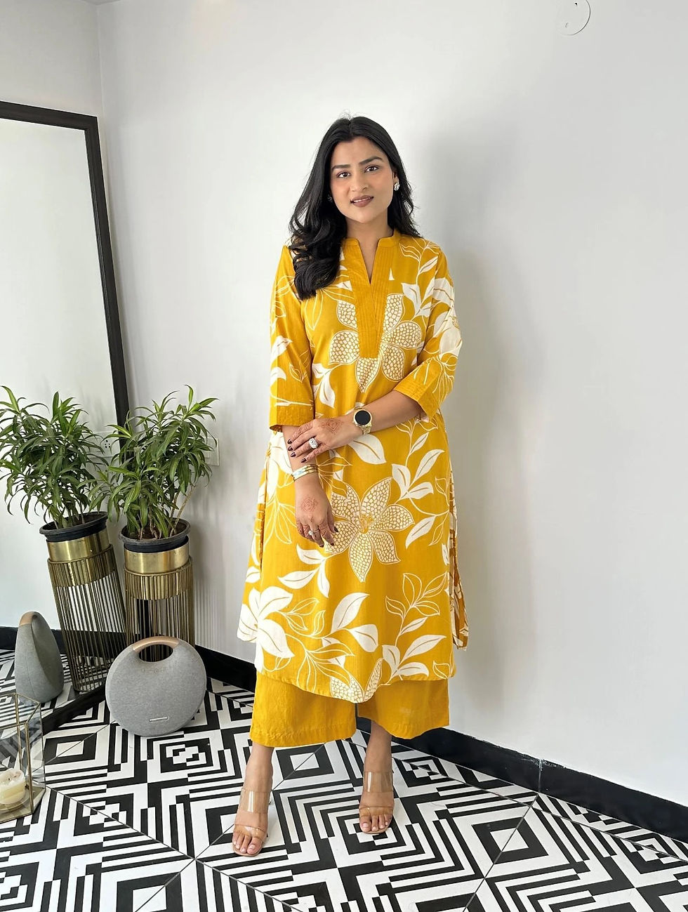 Thumbnail: Model wearing yellow floral printed kurti for casual and festive wear