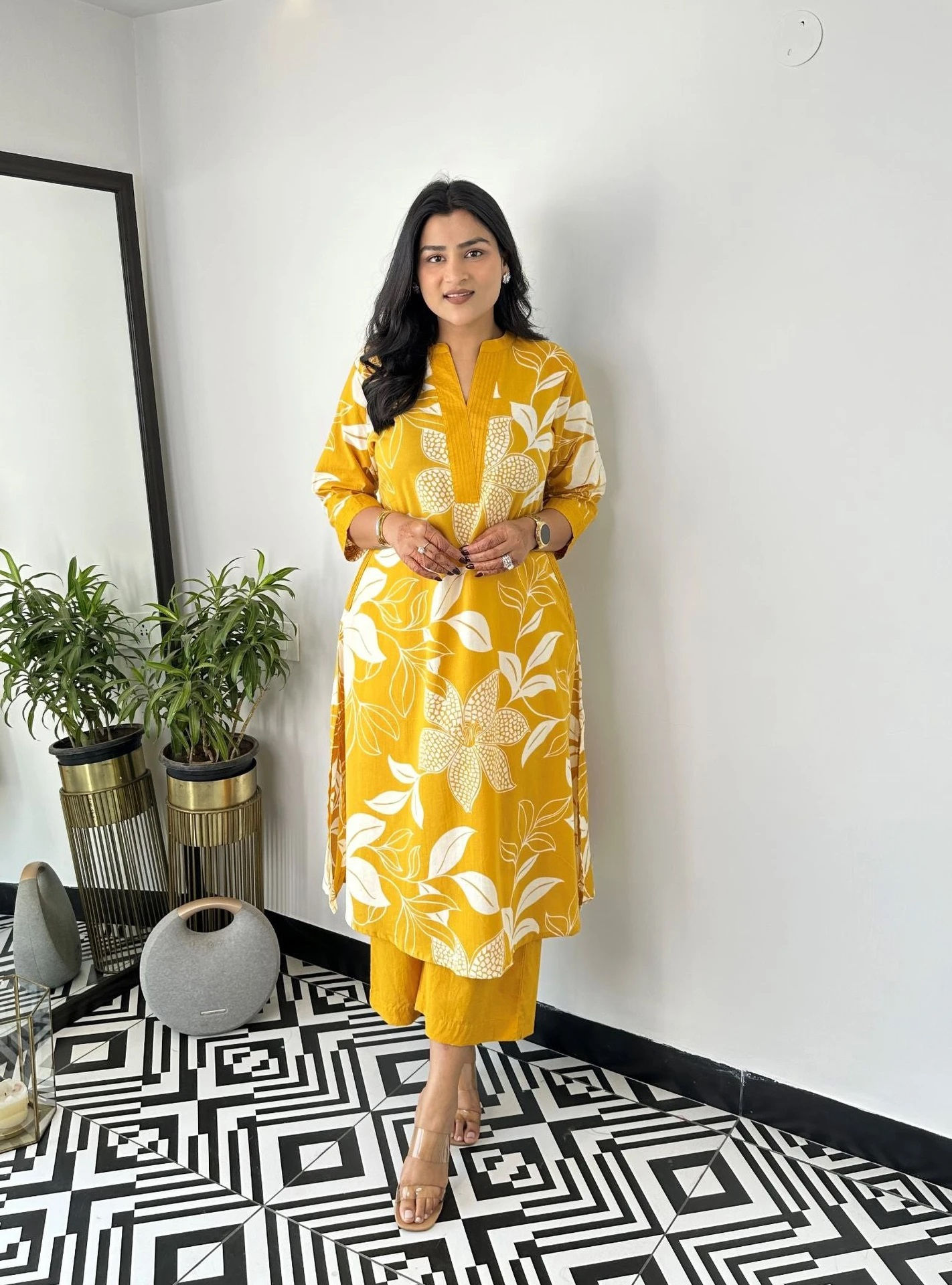 Women yellow floral printed kurti front view with full length design