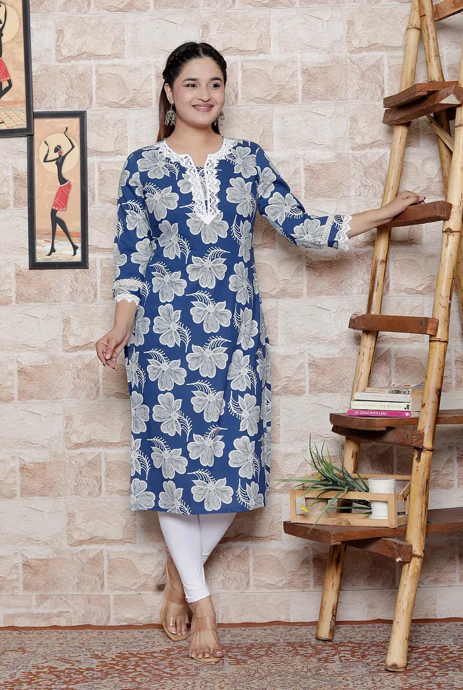 Thumbnail: Women’s blue flower print kurti with 3/4th sleeves and lace work – comfortable casual wear