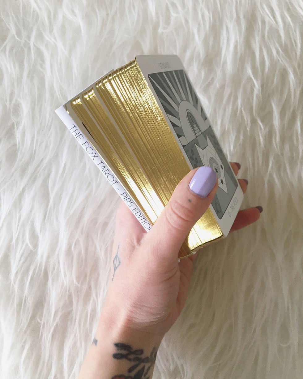 Thumbnail: An image of the tarot deck, cards and packaging