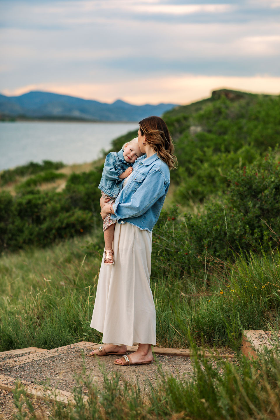 Family of four enjoying the outdoors during an outdoor session in Fort Collins, photographed by a Fort Collins family photographer.
