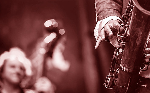 Rare vinyl records wanted! We're looking for all musical genres, imports, audiophiles & mofi. (Photo of man playing saxophone).