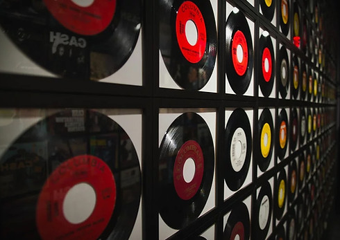 Where can I sell my vinyl records near me? We're always looking for LPs, 78s, and 45s in mint or near-mint condition. (Photo of mint-condition records framed and mounted).