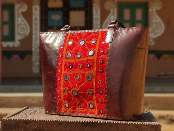 Thumbnail: Leather bag with Kutchi work