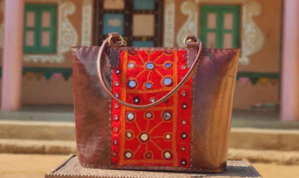 Thumbnail: Leather bag with Kutchi work