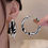 Thumbnail: Black And White Two Tone Hoop Earrings