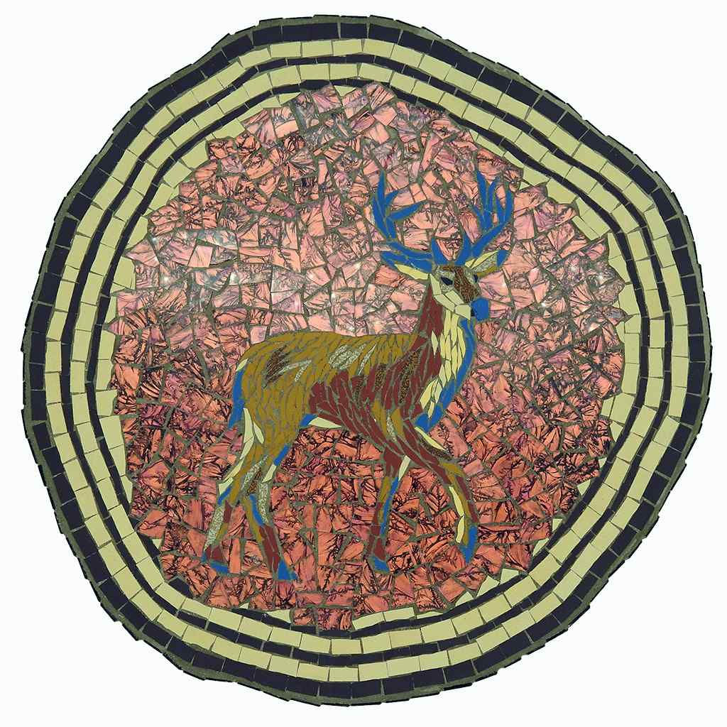A mosaic designed to resemble a tree slice, featuring a deer with antlers set against pink and red tiles by Paul Lilley