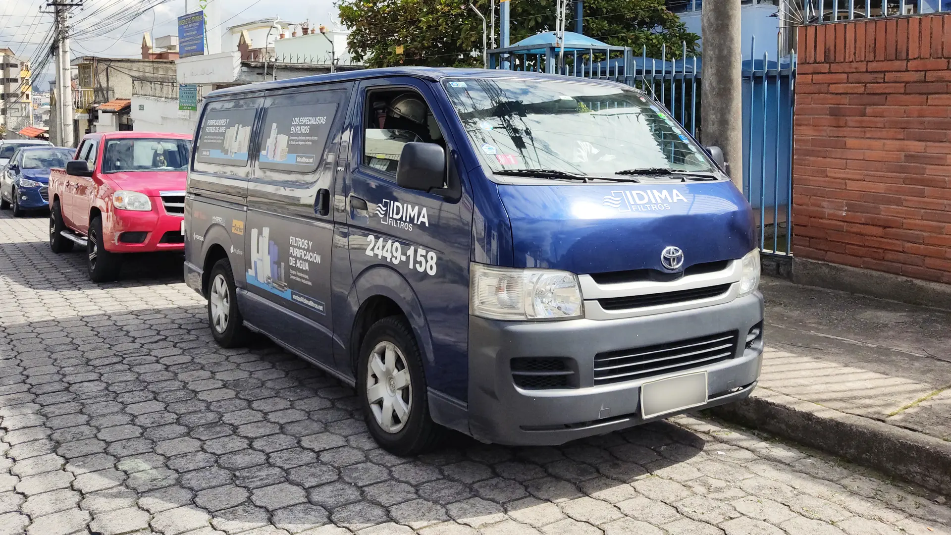 Visual identity applied on the company van for IDIMA CIA. LTDA. in Quito, Ecuador