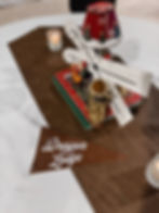 Dragon Lodge centerpiece with skis and festive decor