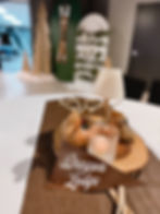 Dragon Lodge table centerpiece with candle and small lamp