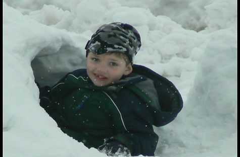 Child playing in snow