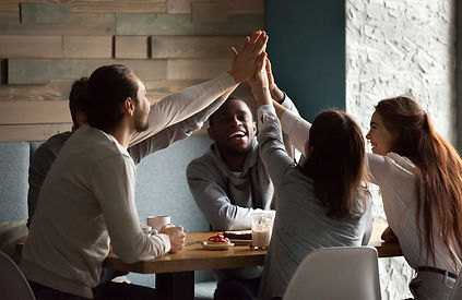 diverse-excited-best-friends-giving-high-five-together-cafe-meeting.jpg