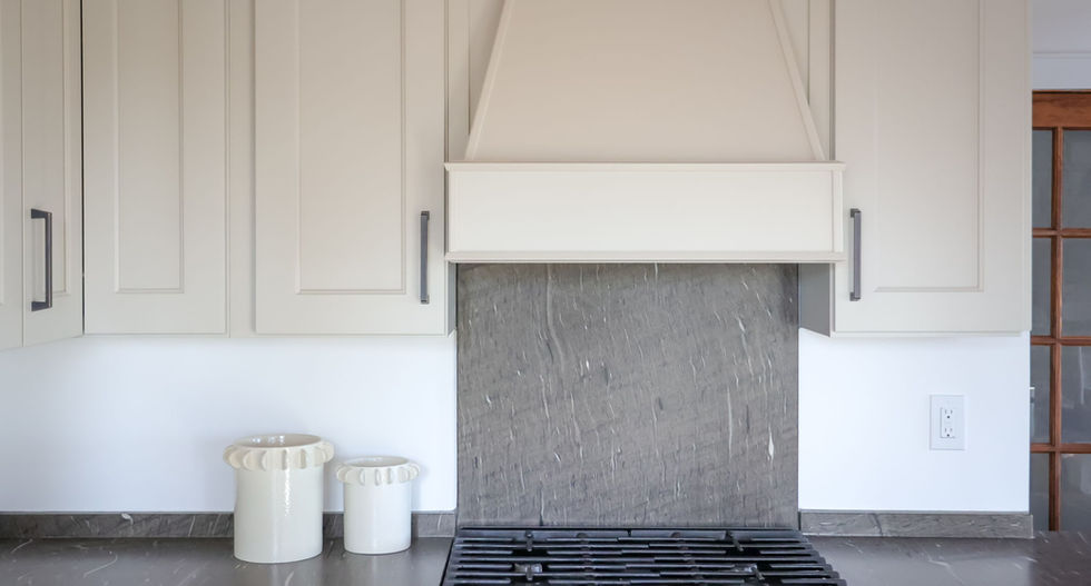 Custom kitchen cabinetry and stainless range by Arrow Works in Boone NC