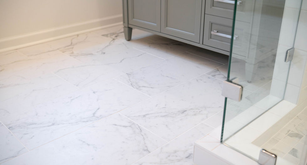 Marble look tile bathroom floor installed by Arrow Works in Spruce Pine NC