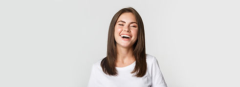 A smiling woman with a bright, healthy smile, representing the positive outcomes from emergency dental care and urgent services offered at Flash DentSpa in Clearwater, FL, where patients receive prompt and reliable treatment from a trusted dental clinic nearby.