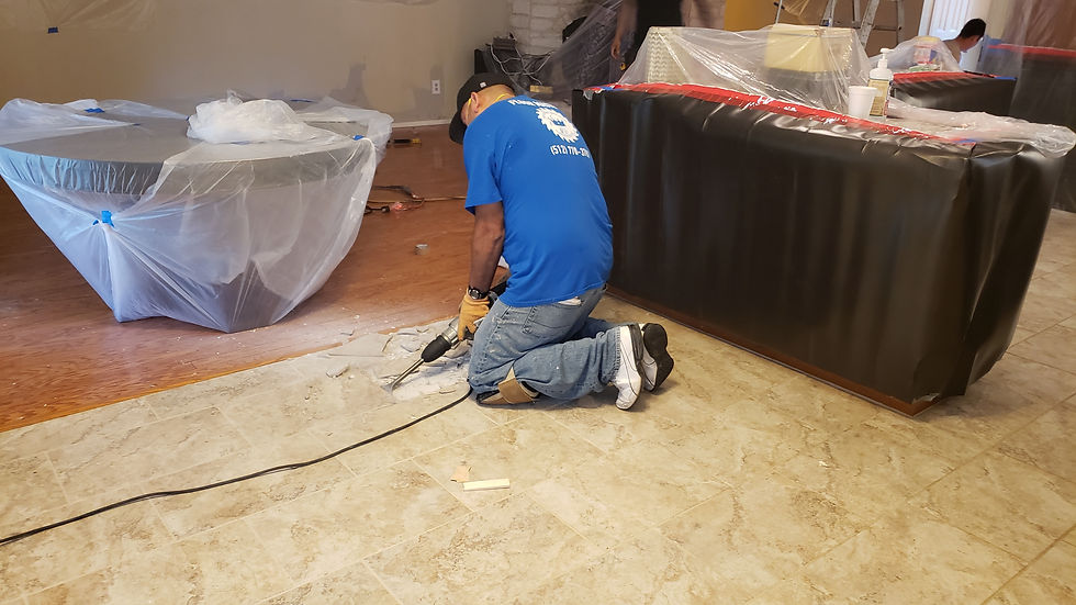 an image of a man working on the flooring