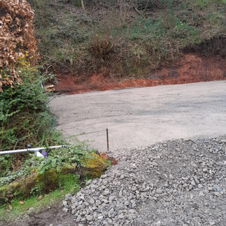 distant view of a cement platform with hardcore pile to the front