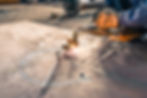 electric wheel grinding a steel structure