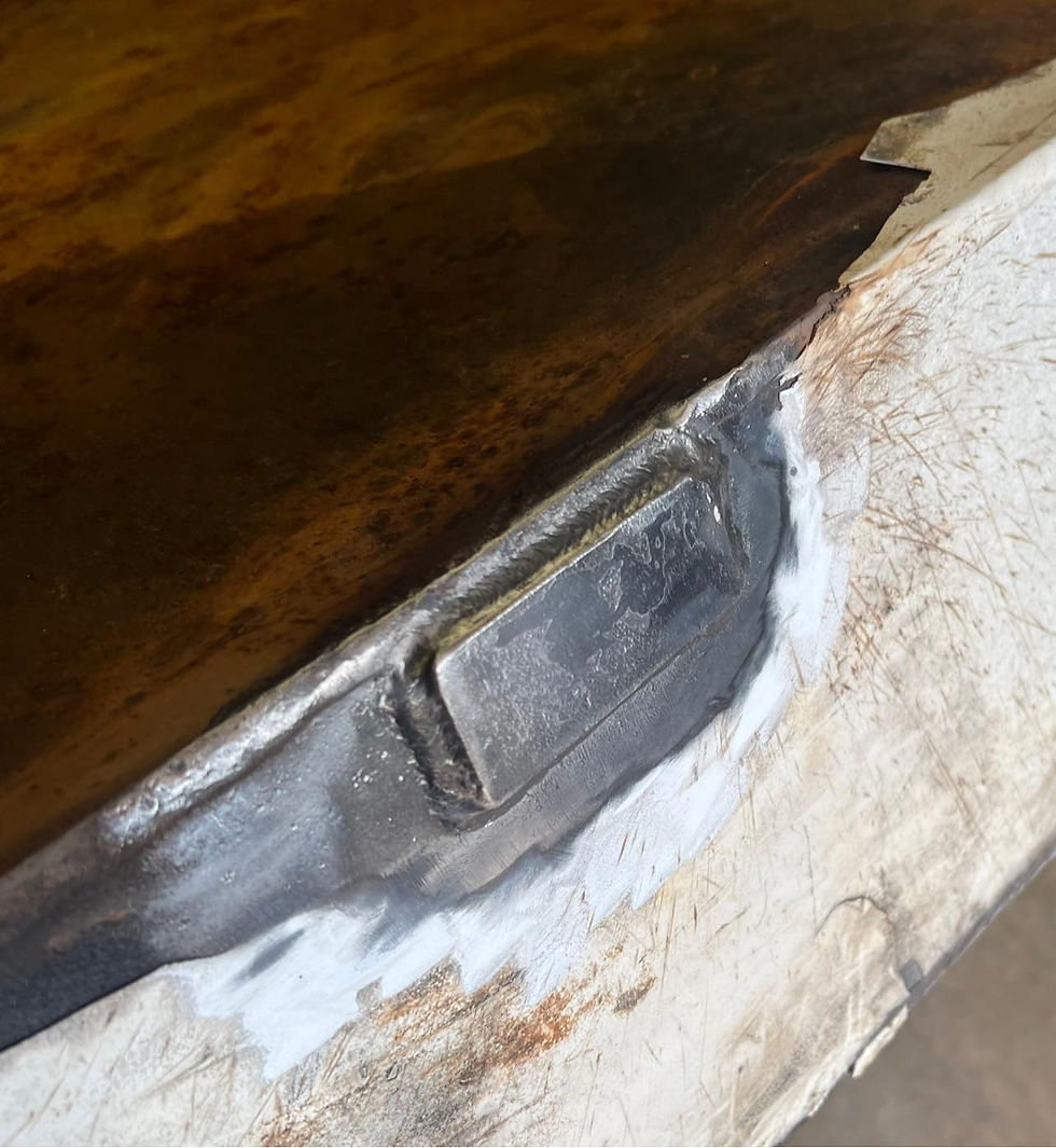 Mobile welding repair of 953 loader bucket in Georgia – custom steel fabrication service