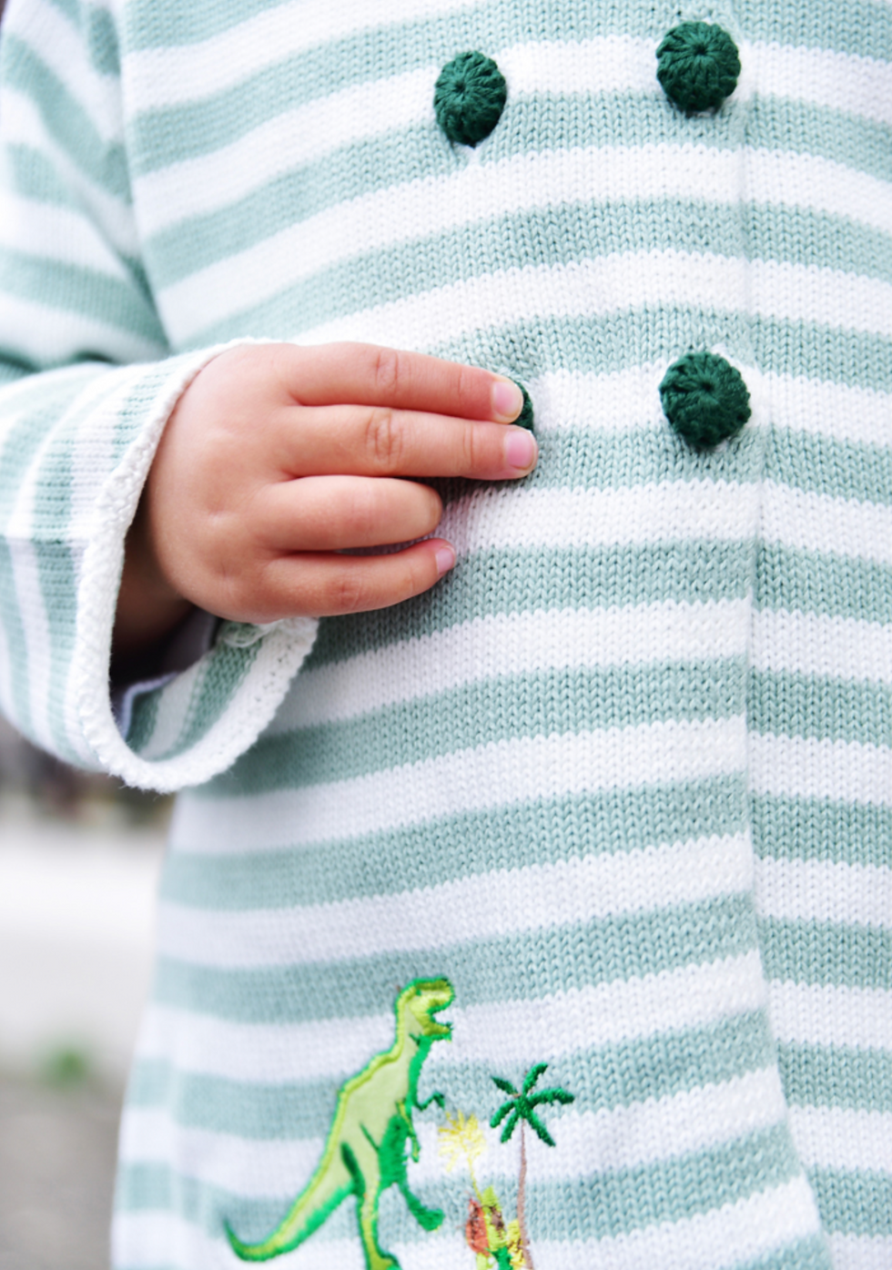 Thumbnail: Dinosaur Knitted Pram Coat