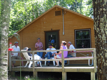 relaxing on a cabin deck, Nevis, Minnesota
