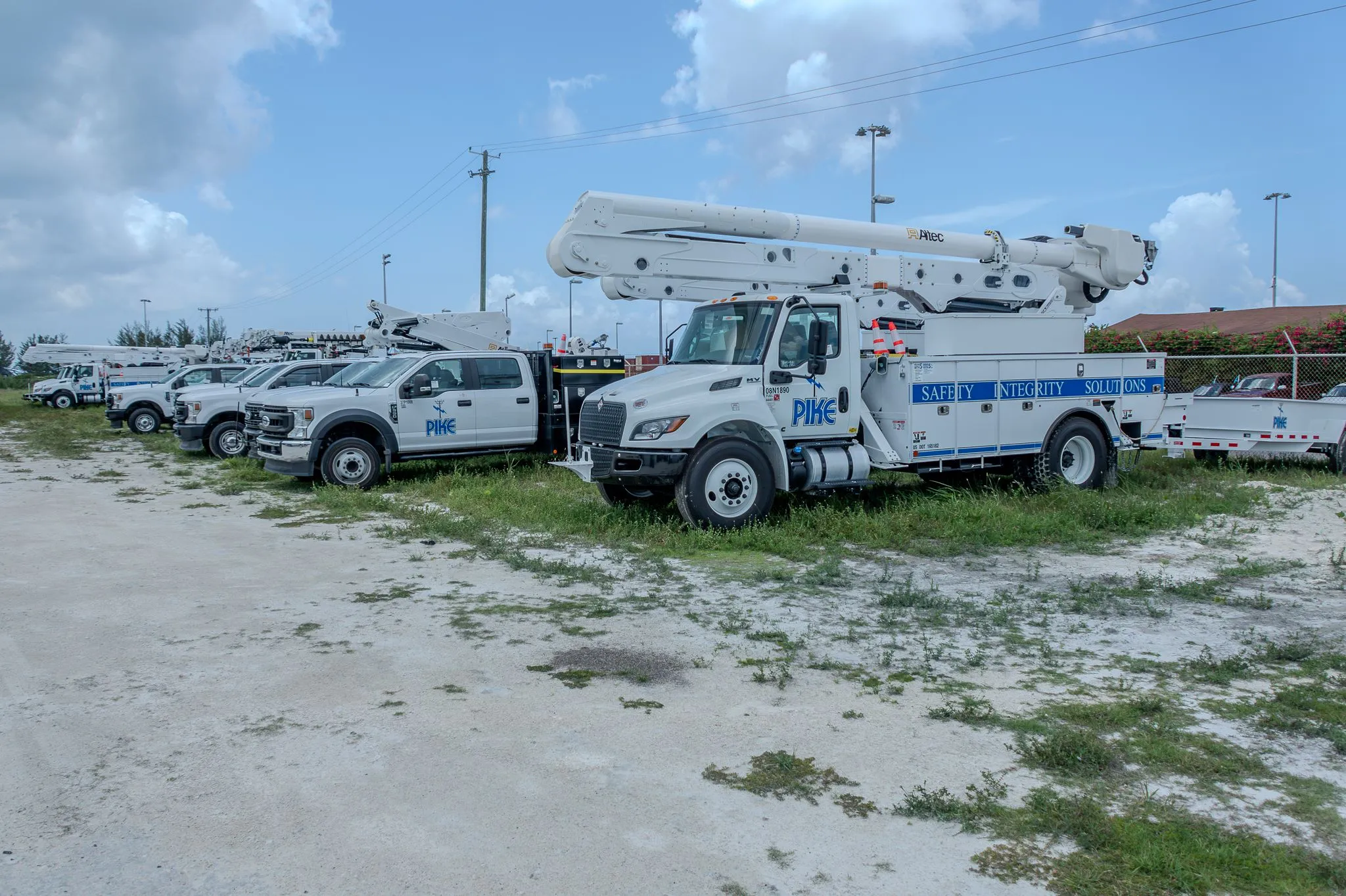 Minister of Energy and Transport Pike Corporation (Island Grid) bucket trucks on Tuesday.  