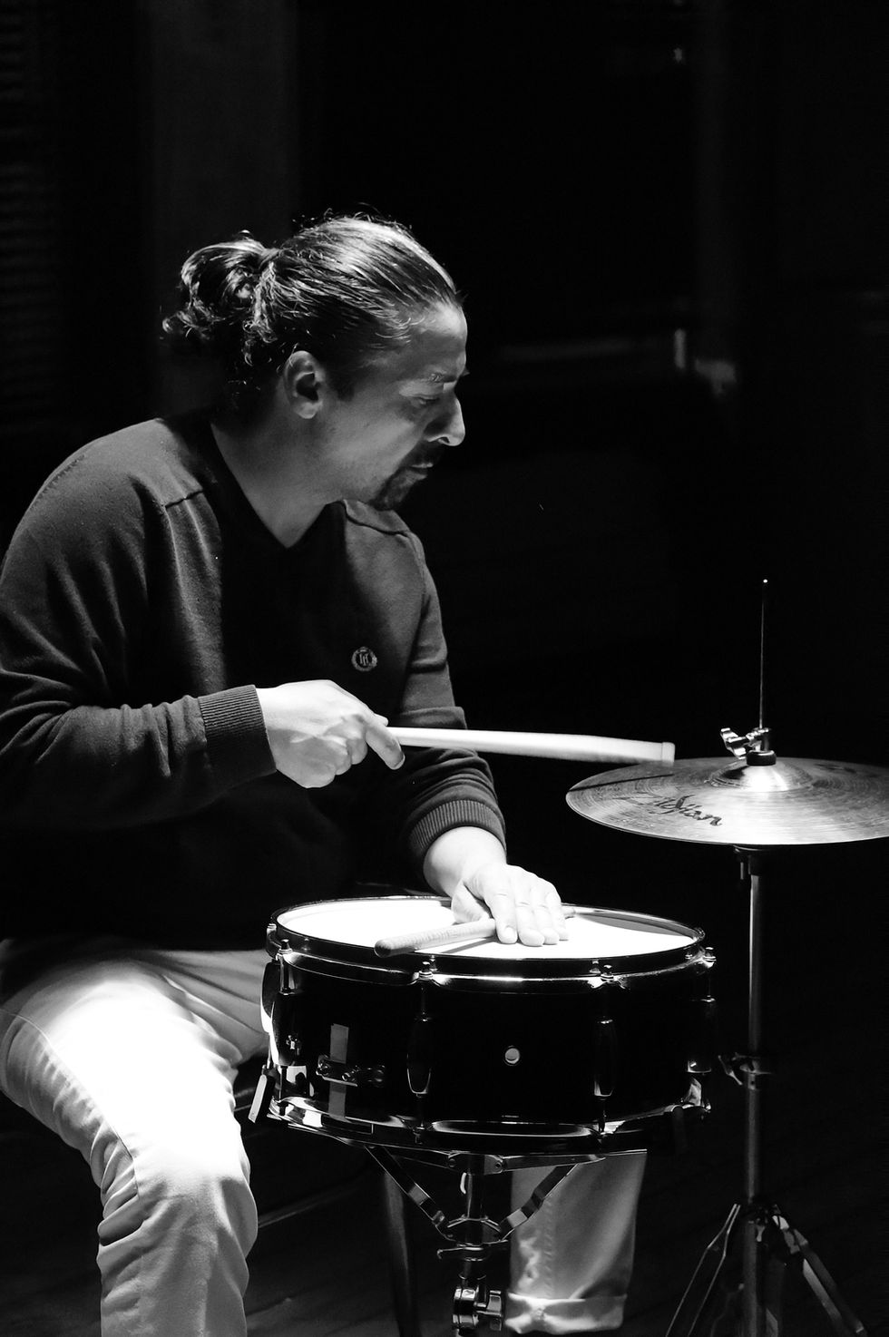 Drummer playing drums at a show