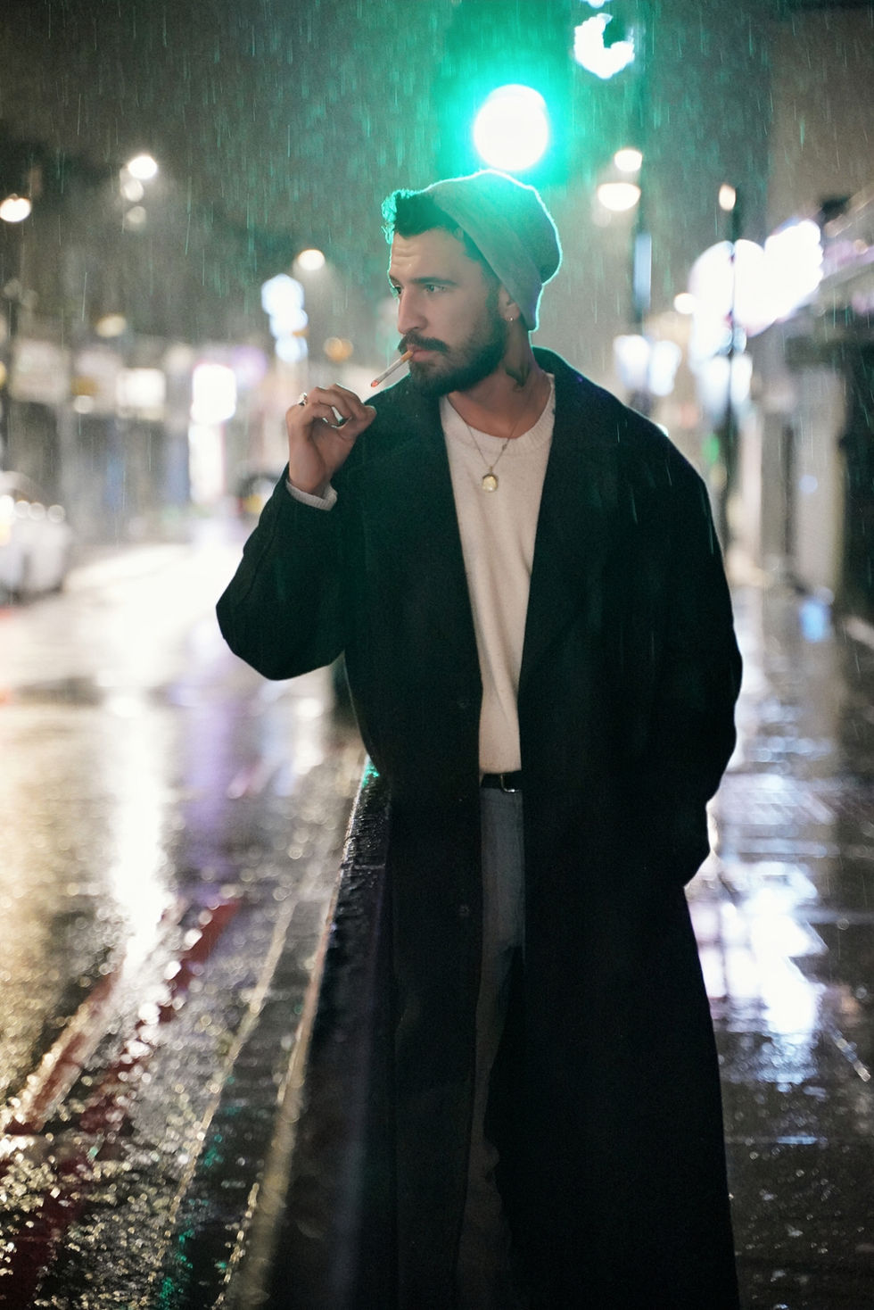 Man in coat at night