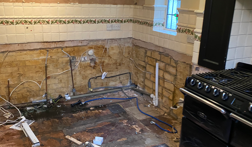 Worn worktops and tired cabinetry that no longer suited the needs of a growing family of four.