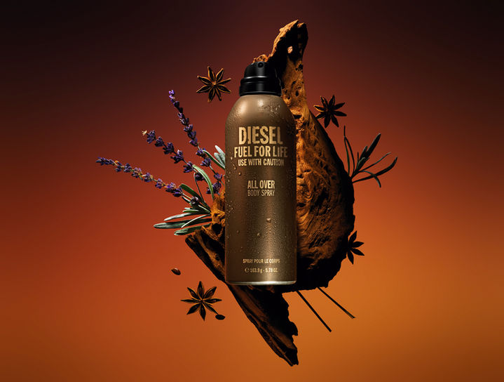 Diesel Fuel For Life body spray with lavender, anise and bark on orange background, by Clement Halborn.