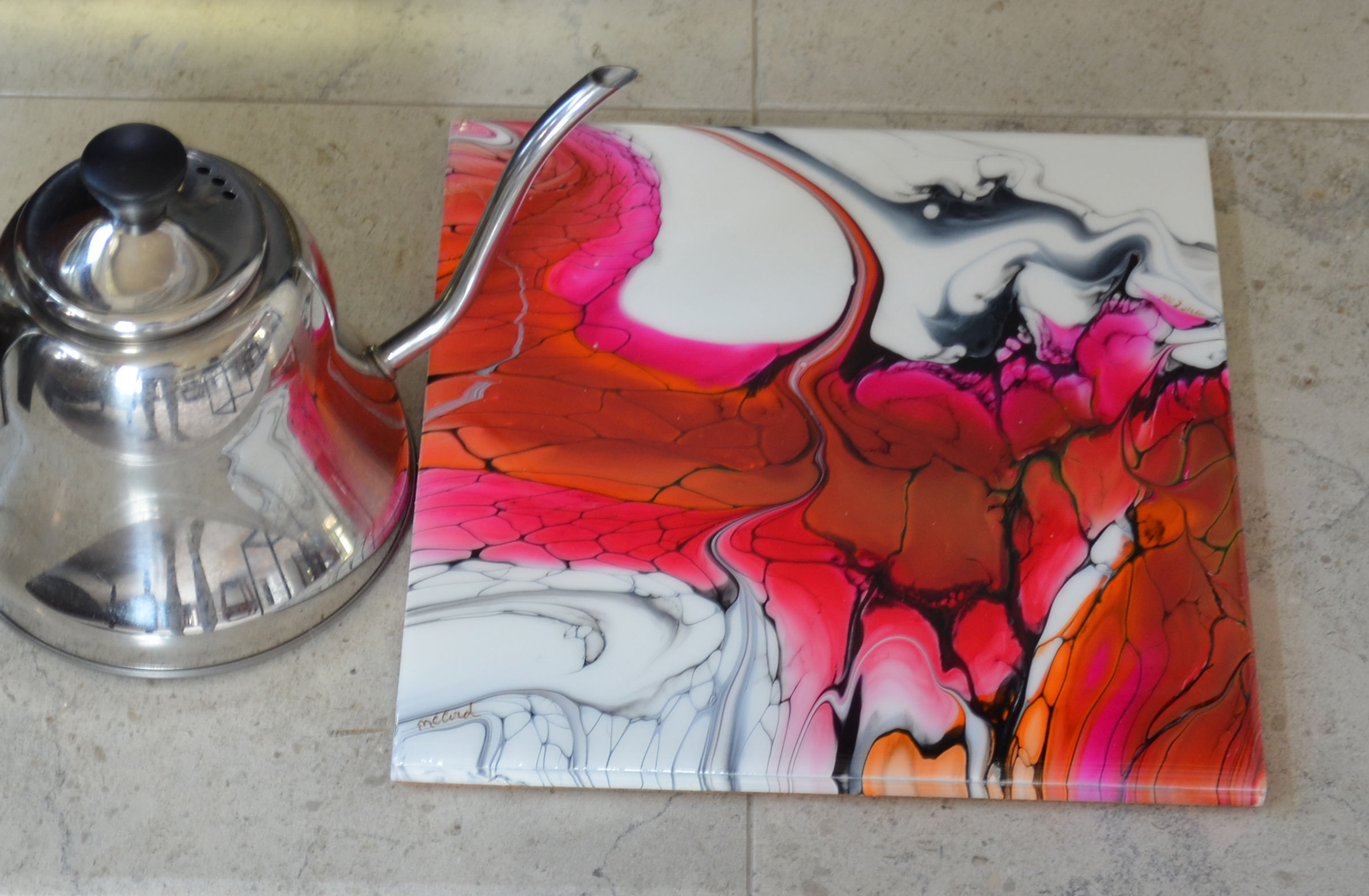 9.75X9.75 trivet.  Alcohol ink on porcelain