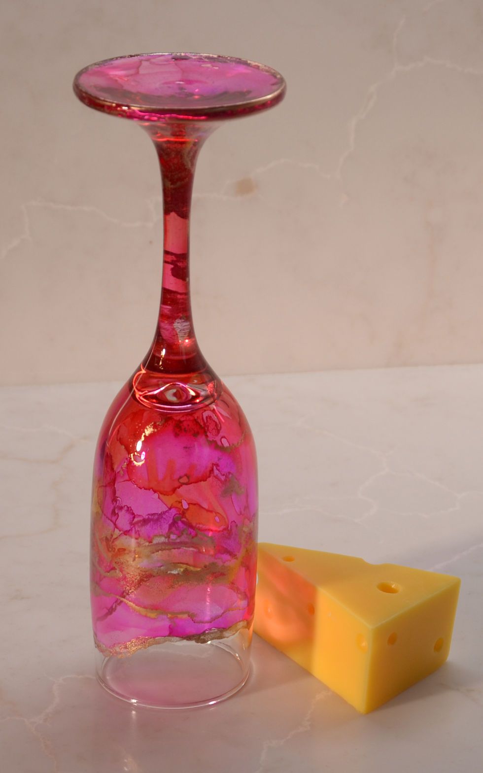 Pink & Orange champagne glass with alcohol ink