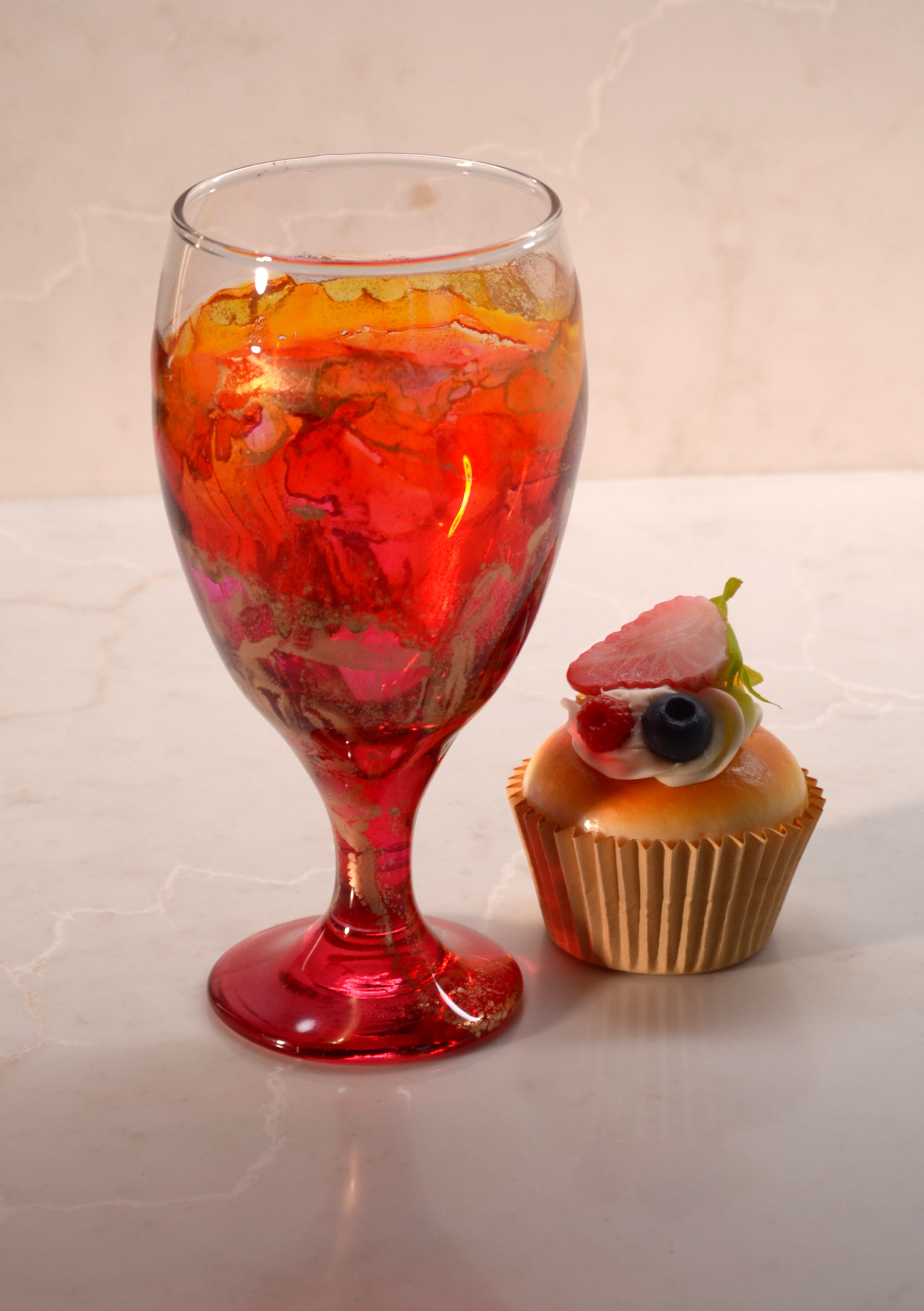 Orange goblet hand painted with alcohol ink