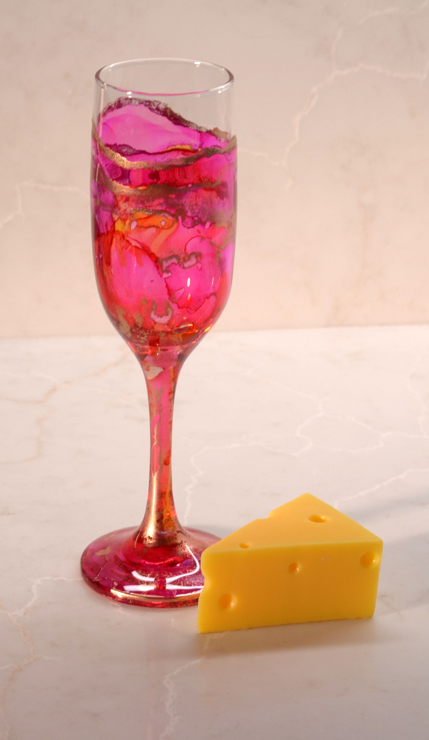 Pink & Orange champagne glass with alcohol ink