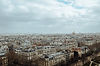 aerial-picture-paris-covered-greenery-buildings-cloudy-sky-france.jpg