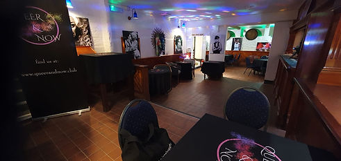 Venue decorated for a Queer and Now event