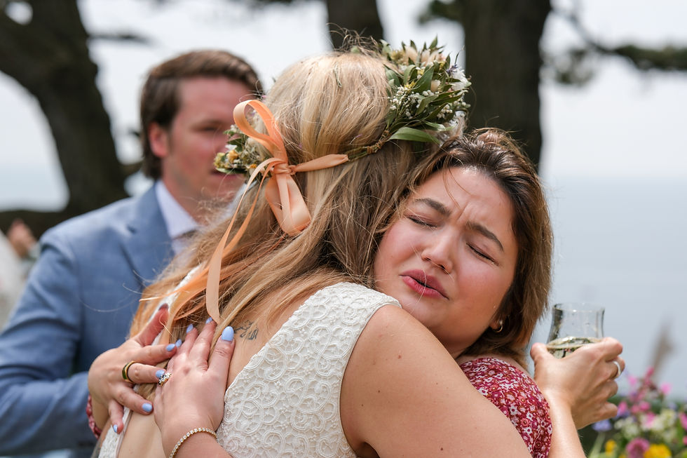 bride hugging friends