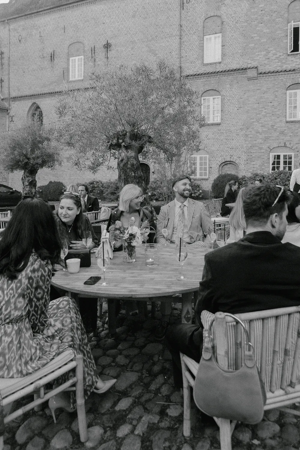 Emotional candid guest moments during Danish castle wedding