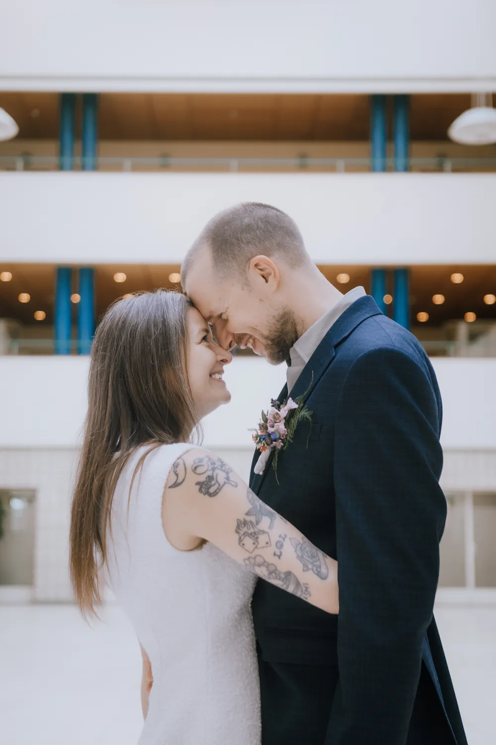 Bride and groom outside Odense City Hall after their civil wedding ceremony.