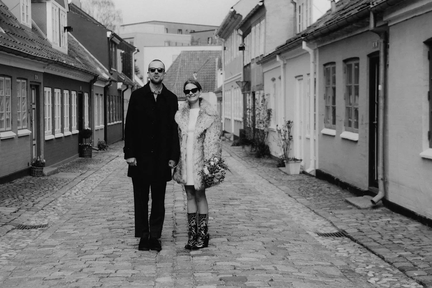 Fairytale-inspired wedding portraits in the colourful streets near H.C. Andersen Museum.