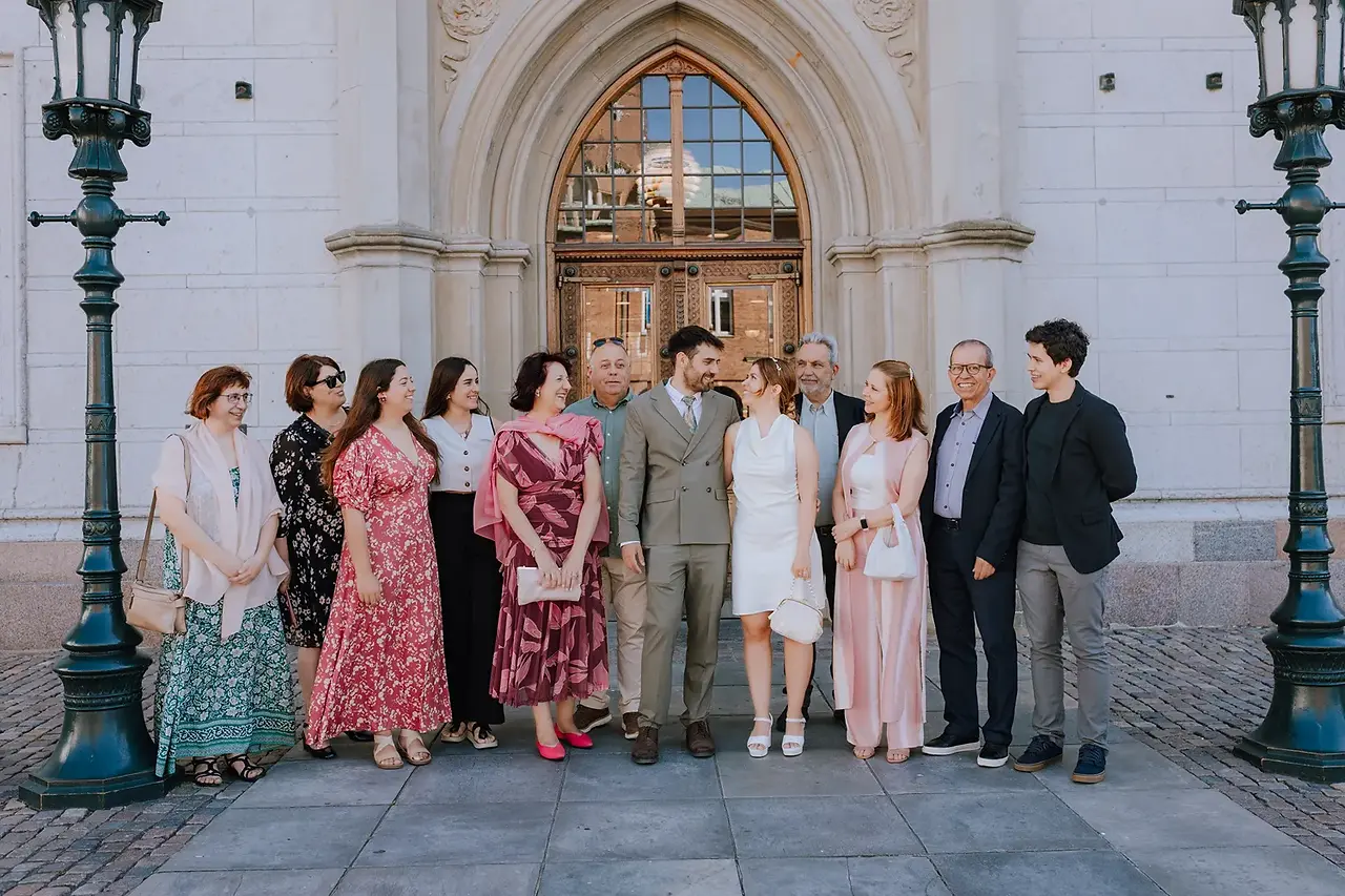 International wedding guests celebrating in central Odense