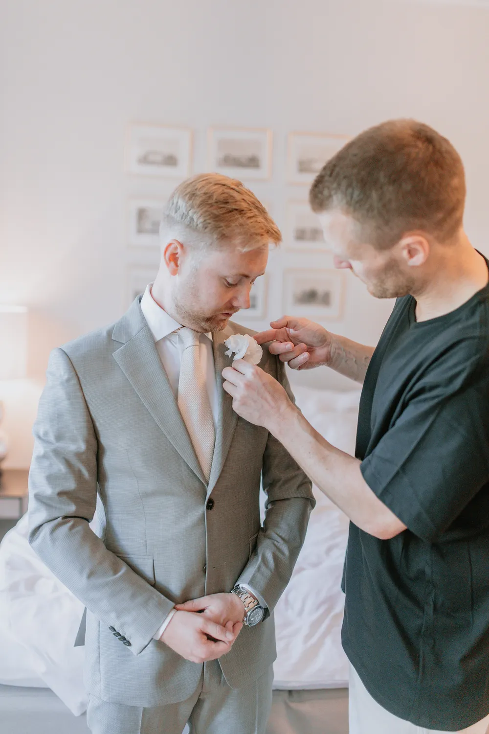 Groom getting ready at Holckenhavn luxury wedding venue in Denmark