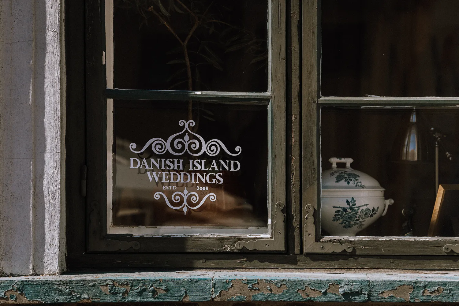Window sign for Danish Island Weddings in Ærøskøbing, Denmark