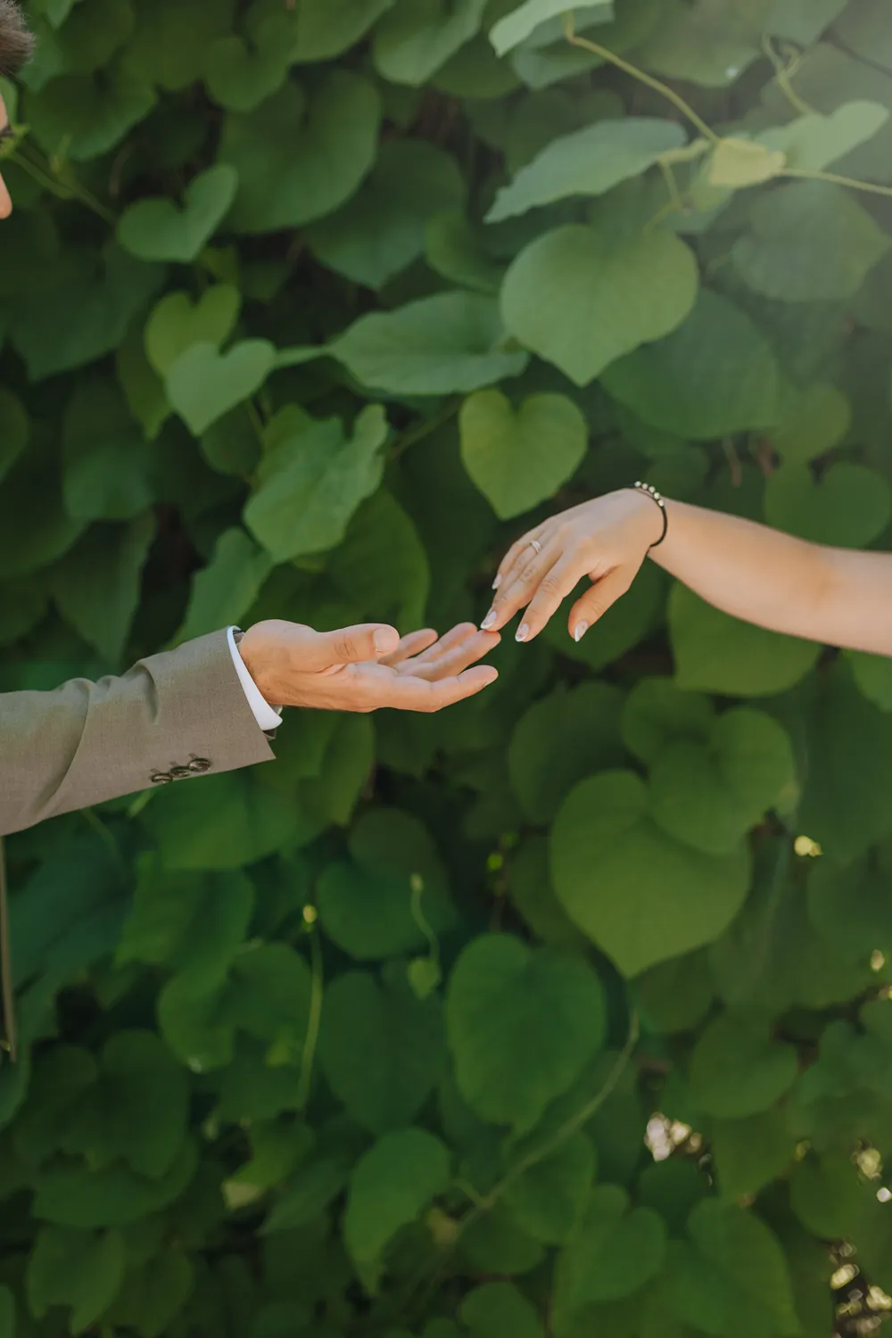 Couple holding hands in the historic H.C. Andersen quarter.