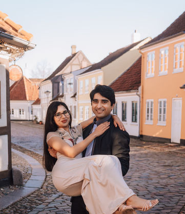 Romantic couple portrait in the historic streets of Ærøskøbing during destination wedding in Denmark