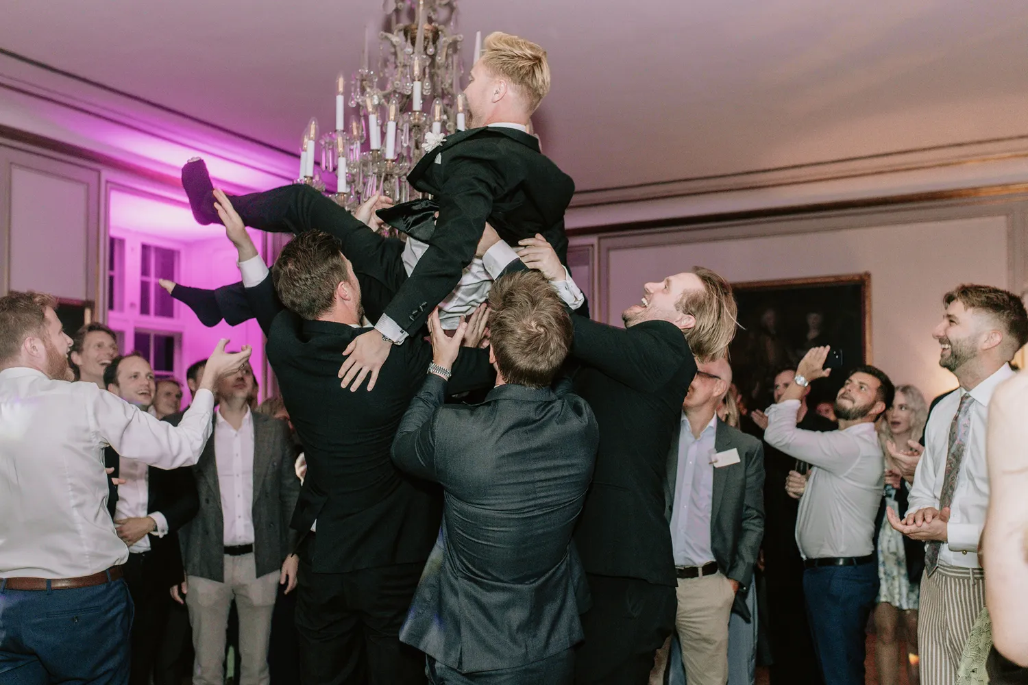 wedding party inside Danish castle venue by Juniper Picture Lab